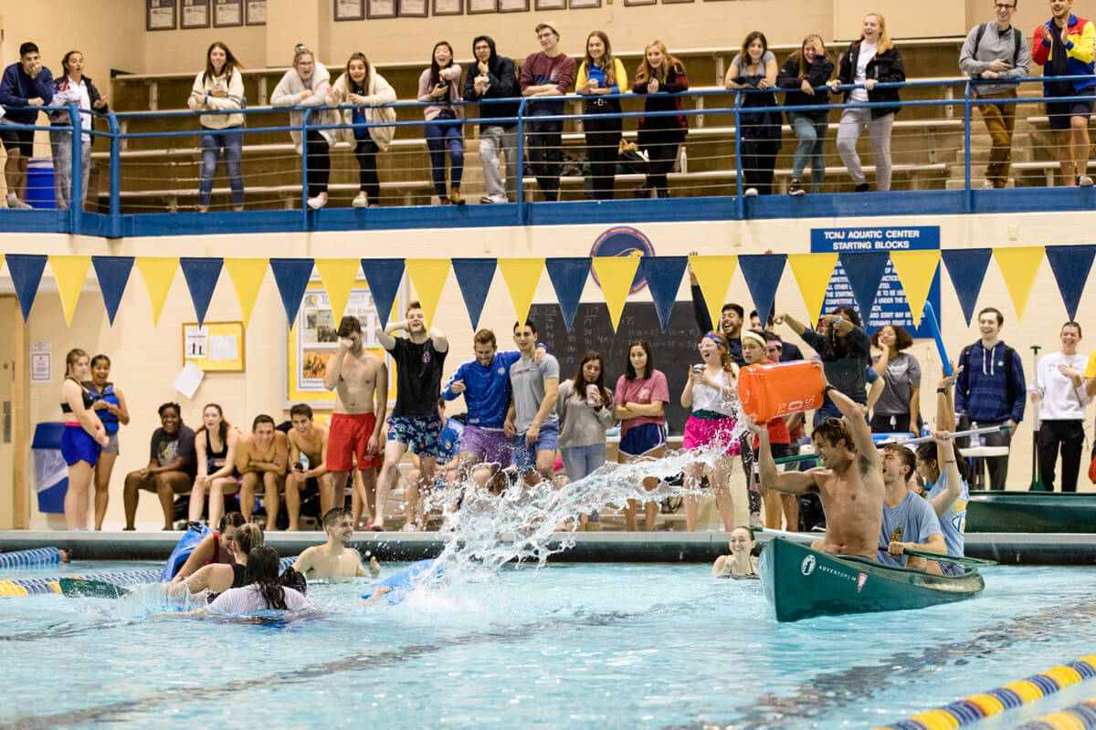 Team Floaters (right) sink their opponents in a friendly game of Battleship.