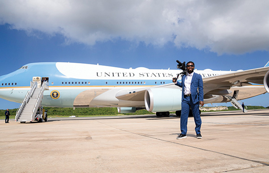 Watson in front of Air Force One