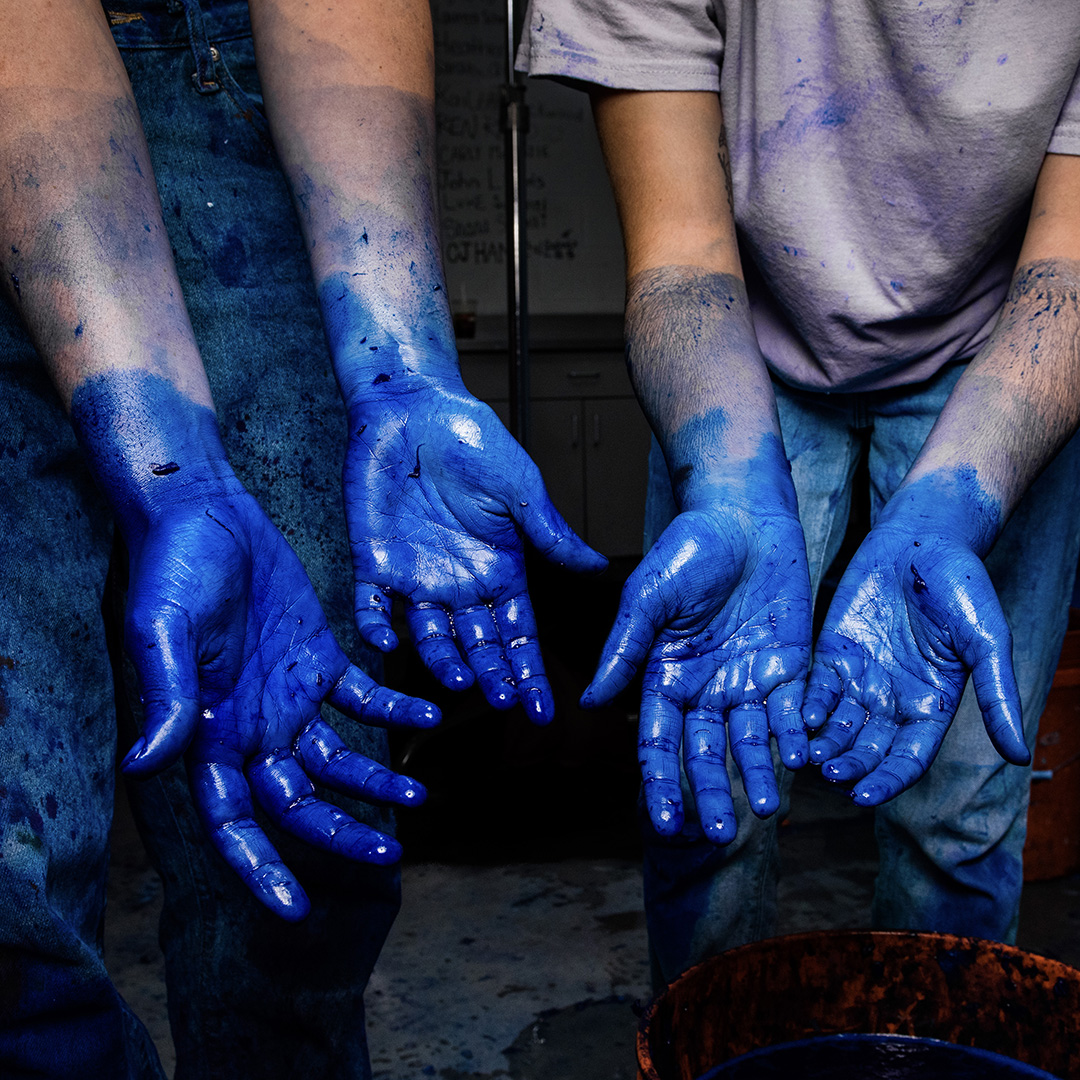 Students make and dye paper for artwork that calls attention to water as a precious resource.