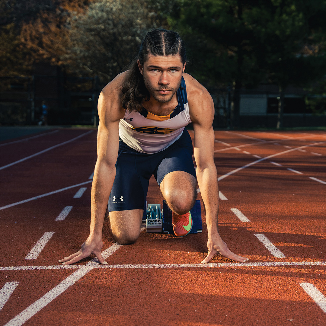 Sprinter Maxim Rychkov '28 at the starting block.