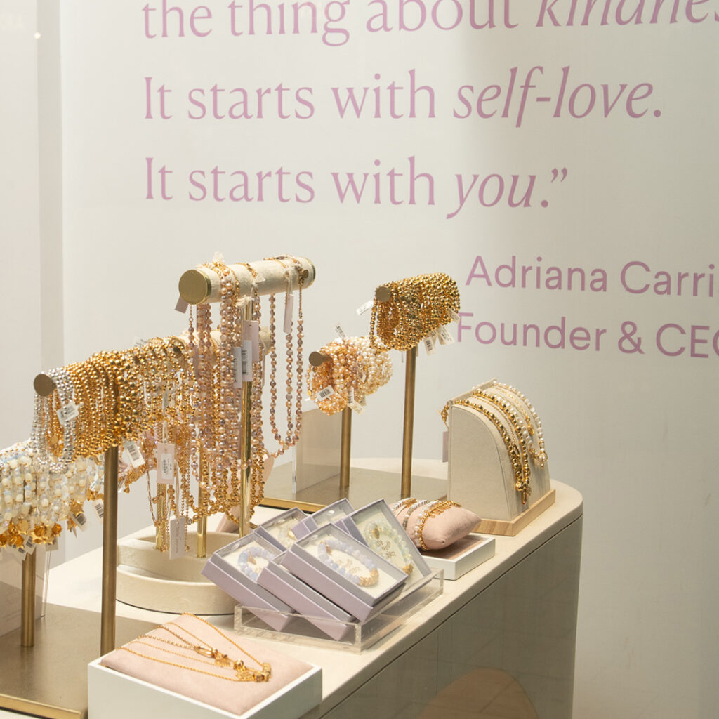 Bracelets displayed on racks in the Little Words Projects shop in the Mall at Short Hills.