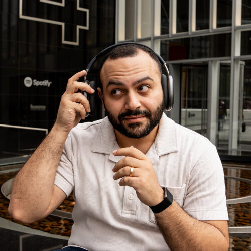 Raphael Rezkalla of Spotify listens to music through headphones.